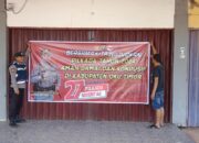 Pemasangan Spanduk Pilkada Damai oleh Polsek Semendawai Suku III