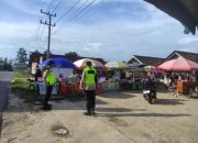Polsek Belitang II Lakukan Patroli Dialogis di Pasar Beduk