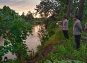 Polsek BP Peliung Tingkatkan Giat Monitoring Debit Air di Area Pemukiman Bantaran Sungai Komering