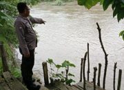 Polsek BP Peliung Lakukan Monitoring Debit Air di Bantaran Sungai Komering