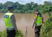 Polsek BP Peliung Lakukan Monitoring Debit Air di Bantaran Sungai Komering